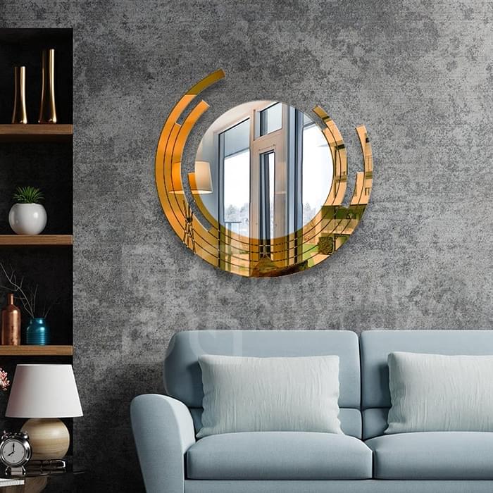modern golden and silver round mirror. a statement piece for elegant living spaces